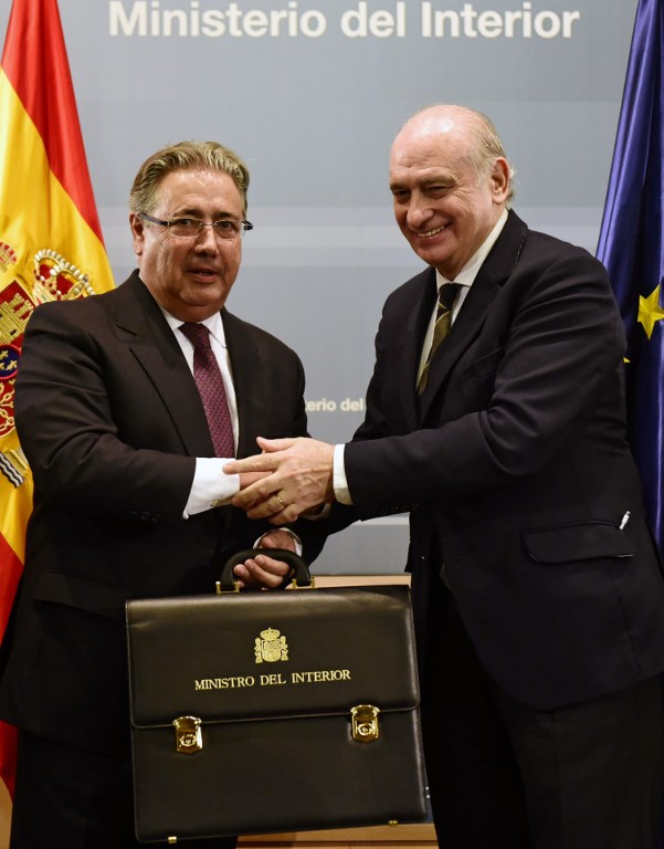 Los exministros de Interior Juan Ignacio Zoido y Jorge Fernández Díaz. - AFP